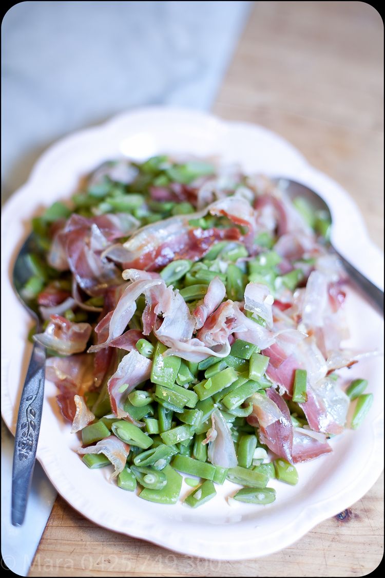 Beans are cut very small and mixed with lightly fried flat pancetta. 