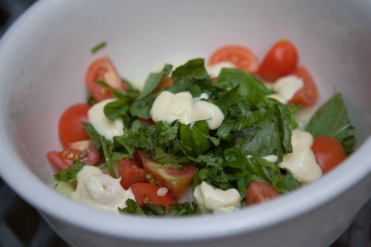 Cucumber, tomato and basil salad dressed with mayonnaise and apple cider vinegar.