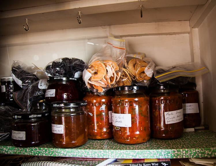 In her cupboard a shelf full of home preserves and dried apples and plums from her trees. Now you must try home grown home dried apples especially those with skin on! They are intensely deeply richly flavoured. They are soooo blooming wonderful!