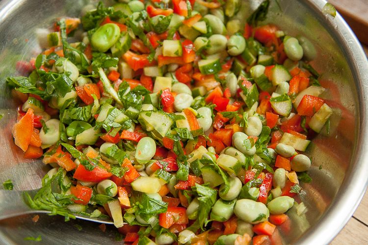 Simple, healthy and delicious: broad beans, red capsicum, cicory and cucumber salad marinated in lemon juice, virgin olive oil, and a dash of truffle scented oil. The broad beans were cooked in salted boiling water for about three minutes, just enough to sweeten and soften them.