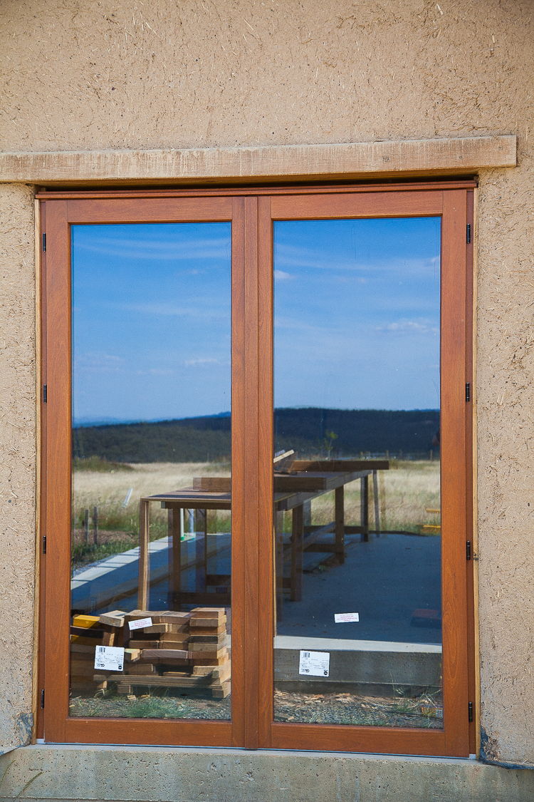 Building detail: these double glazed doors have been imported from Germany via Timber Tech,  for the simple reason that to obtain a similar quality product from the Australian equivalent would have cost us double the price, making it impossible for us to use a high quality glazing product on this build. As windows and doors are weak spots of the building envelope: a great deal of heat is lost or gained, it was important to us to use a glazing option that diminished our long term energy use. Paarhammer produce an excellent product, here in Australia. We have used them on a smaller project and have been extremely happy. 