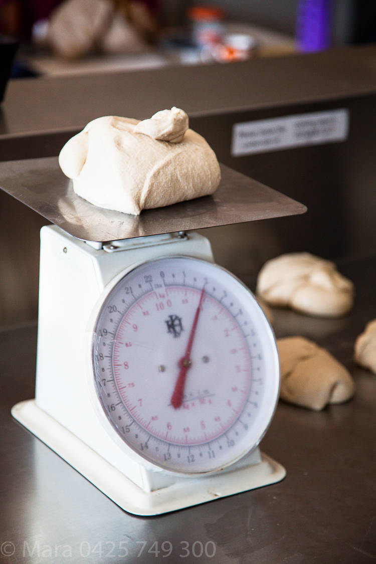 Weighing 900g loaves. 